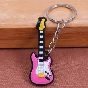 Брелок резиновый Электрогитара. Цвет розовый.