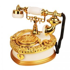 Музыкальная шкатулка Ретро телефон. Цвет черный и белый. Размер 19 х 18 х 17 см.