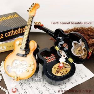 Музыкальная шкатулка заводная Гитара. Материал - АБС пластик.